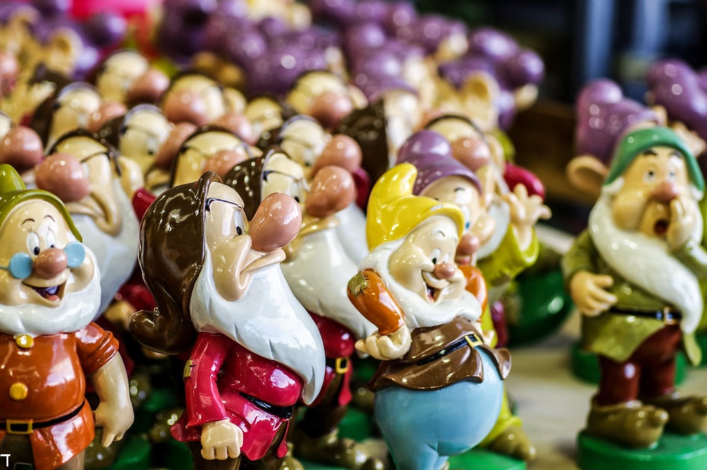 a lot of garden gnomes from the cartoon Snow White and the 7 Dwarfs